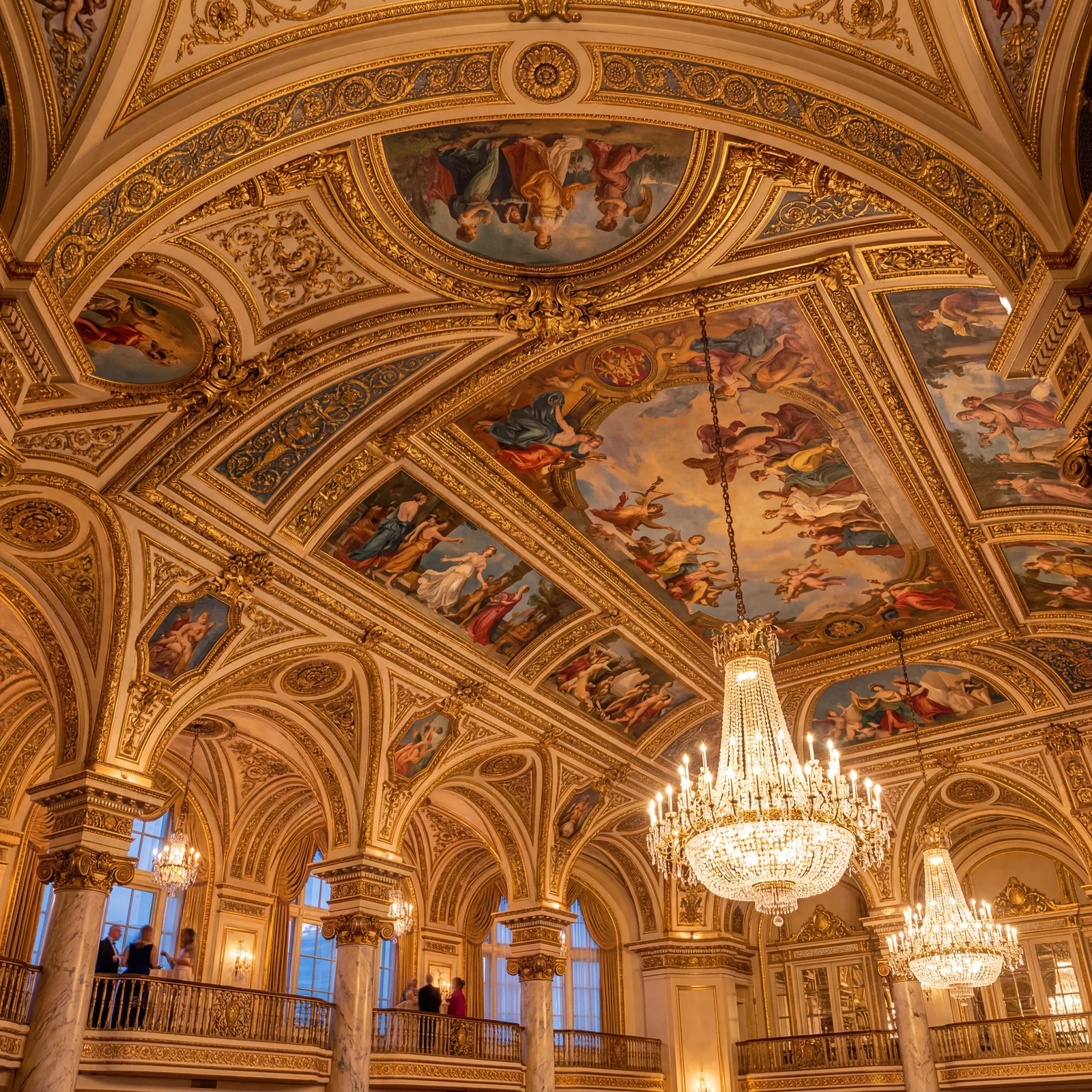 Ornate Beaux-Arts ballroom ceiling in the Palmer House Chicago covered in French frescoes and gilded architectural details, warm editorial travel photography, golden hour, photorealistic, no text, no watermark, 16:9