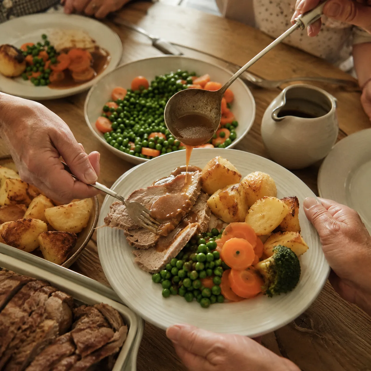 Realistic editorial photo of a family dinner plate with small slices of meat, potatoes, vegetables, and gravy, practical